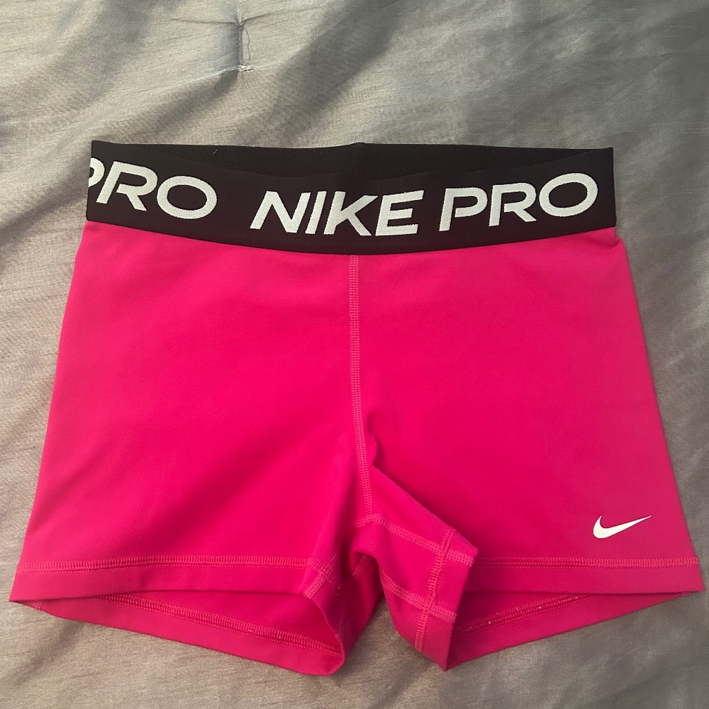 Pink Nike pros